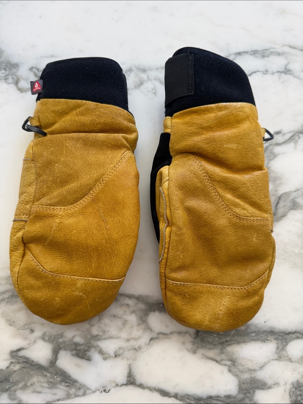 Women’s Flylow Leather Mittens in Mustard Yellow with Black Cuff